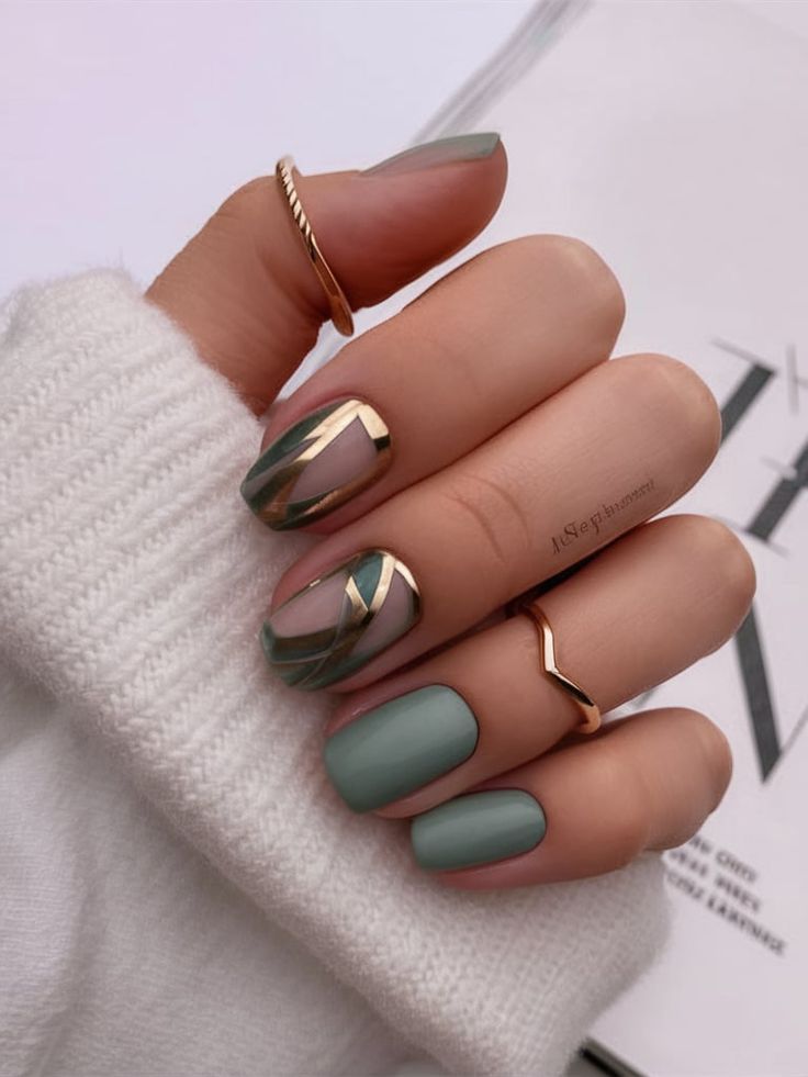 Chic Nail Design with Matte and Glossy Finishes, Metallic Accents, and Geometric Patterns.