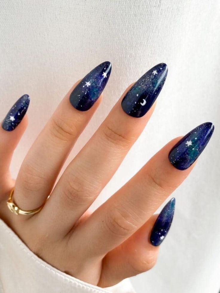 Celestial-Inspired Deep Blue Gradient Nail Art with Stars and Crescent Moon