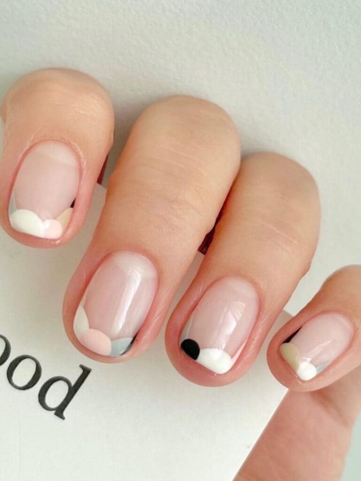 Trendy Geometric Nail Design in Soft Pastels with Artistic Flair.