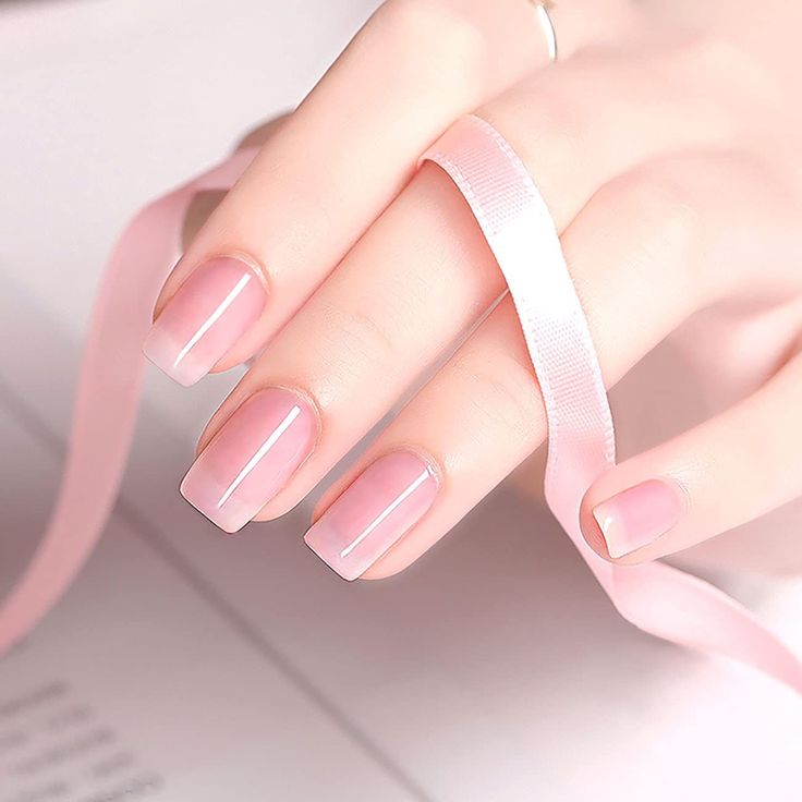 Elegant Nude Pink Ombre Nails: Subtle Glossy Finish for Understated Sophistication.