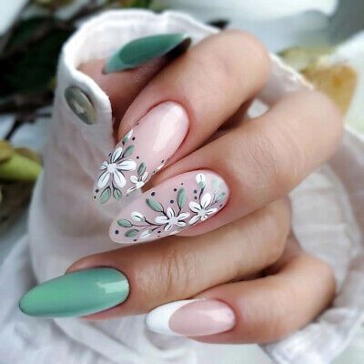 Charming Floral Nail Design in Soft Pastels with Elegant Accents.