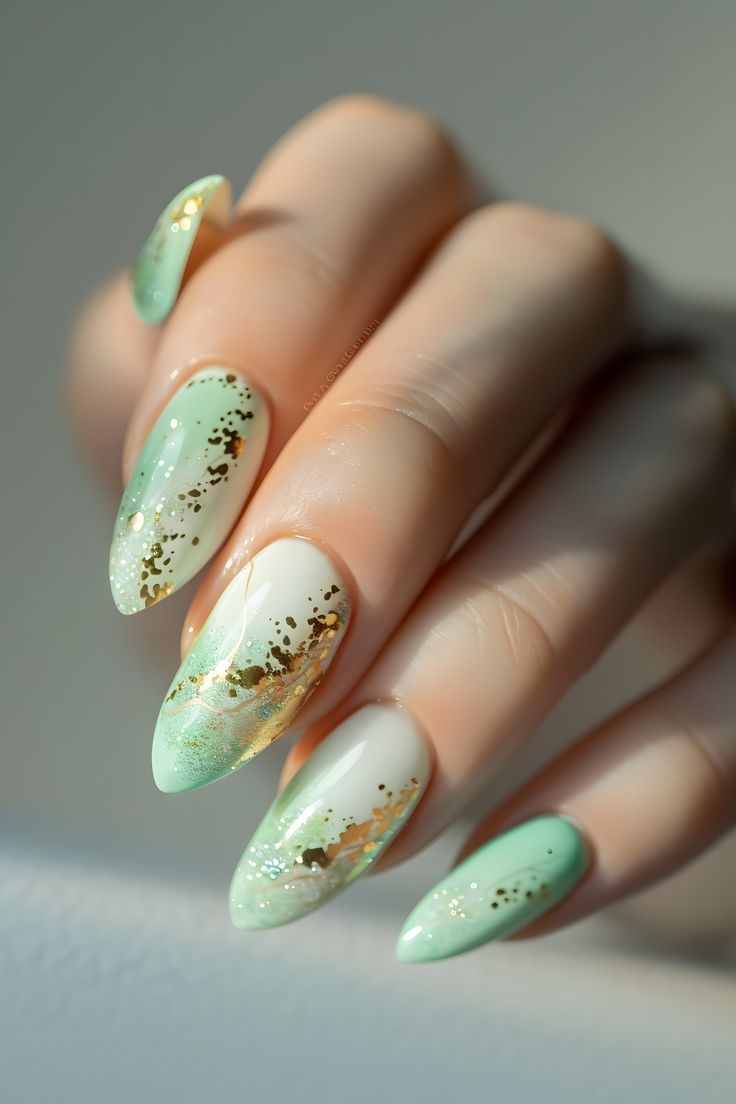 Sophisticated Almond-Shaped Mint Green and White Nail Design with Gold Accents