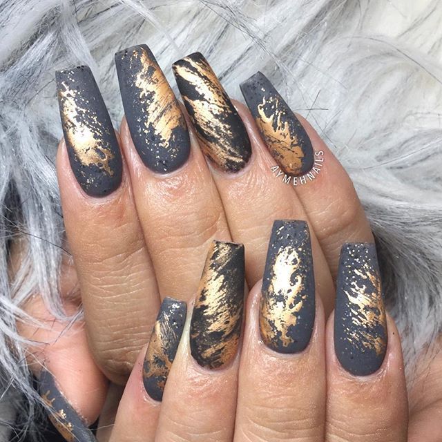 Elegant Charcoal Gray and Metallic Gold Textured Matte Nails with Artistic Brush Stroke Design.