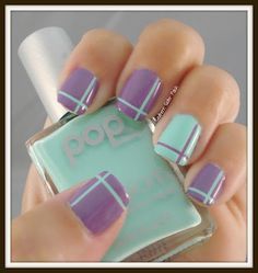 Chic Geometric Nail Design in Lavender and Mint Green with Bold Intersecting Lines.