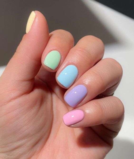 Whimsical Pastel Nail Design with Playful Hues.