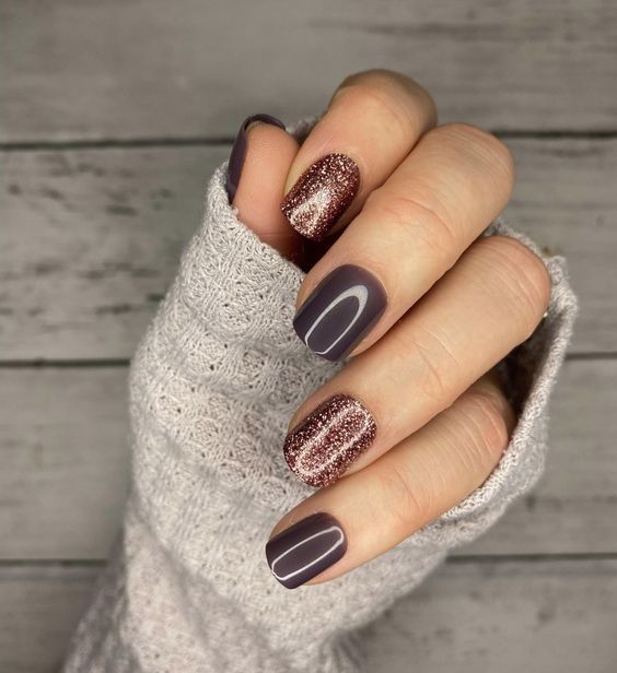 Chic Deep Mauve and Shimmery Glitter Nail Design for Any Occasion