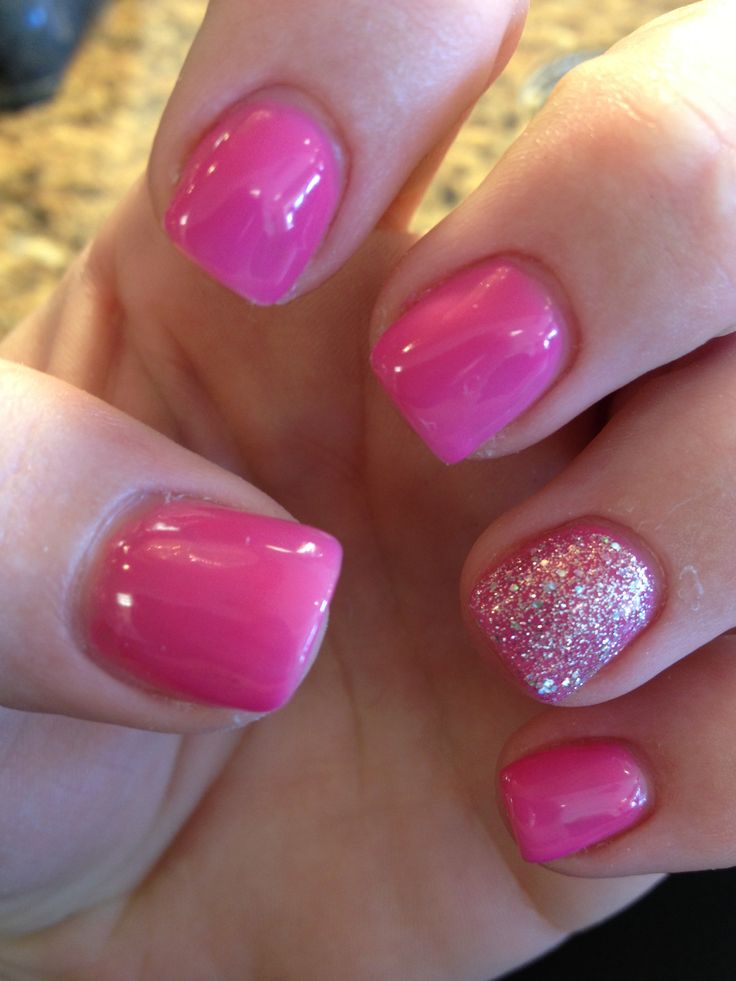 Playful Pink Manicure with Glossy and Glitter Finishes.