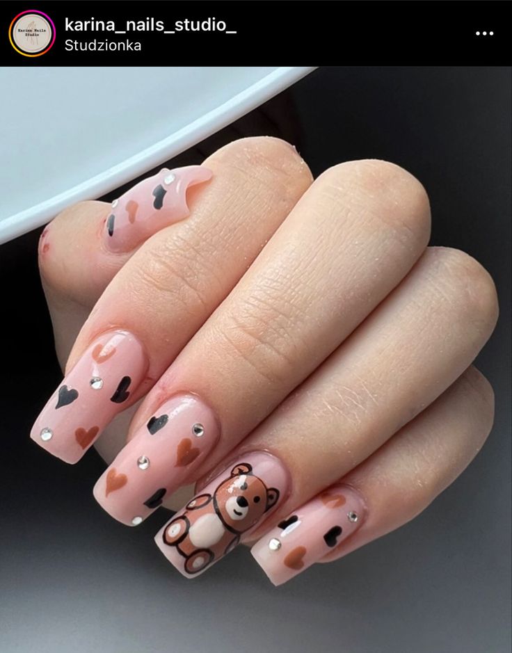 Charming Heart and Teddy Bear Nail Art: A Whimsical Blend of Cuteness and Elegance.