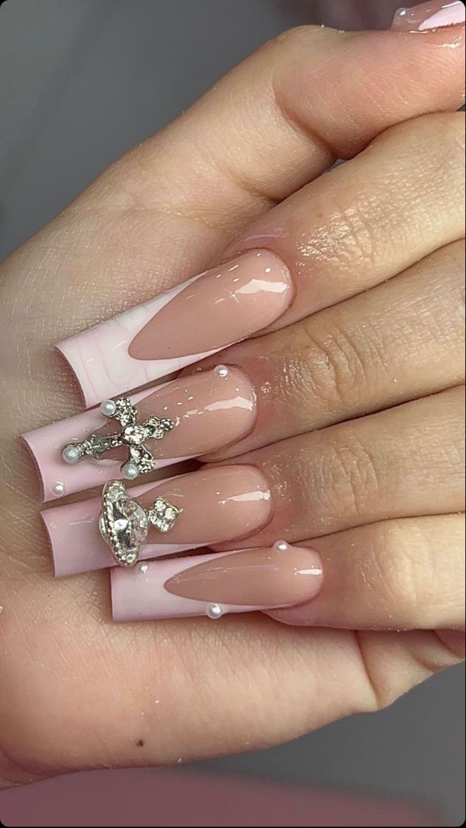 Sophisticated Soft Pink Nail Design with Glossy Finish and Luxurious 3D Embellishments.