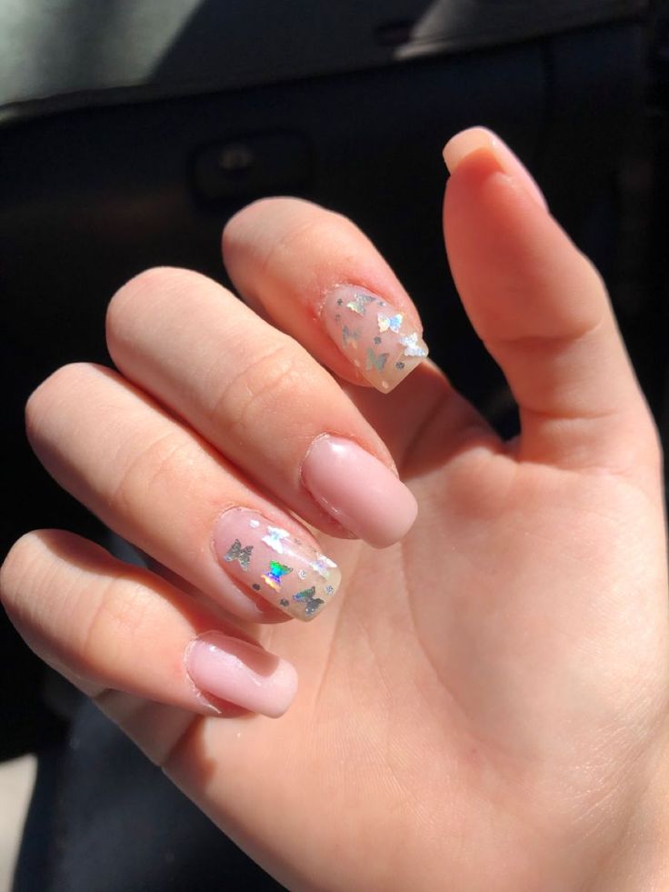 Whimsical Pastel Nail Design with Glitter and Holographic Accents