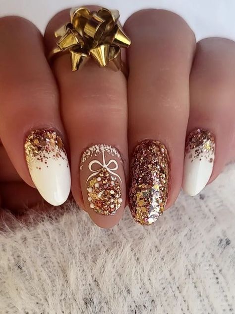 Glamorous Festive Nail Design with Shimmering Gold and White Gradient.