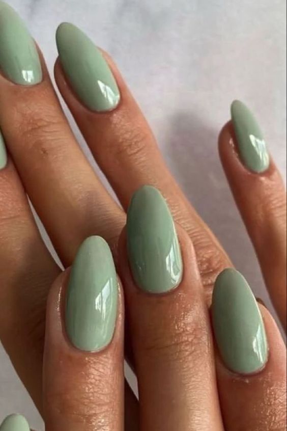 Sophisticated Pastel Green Almond-Shaped Nails for Any Occasion