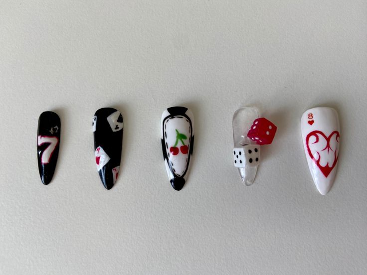 Bold Playing Card-Themed Nail Designs with Casino Motifs