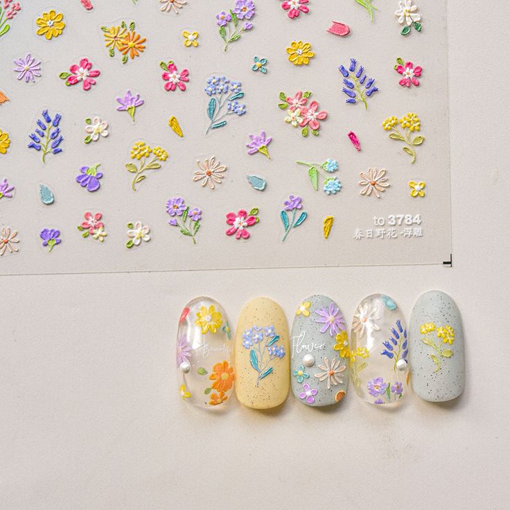 Vibrant Pastel Floral Nail Designs for a Whimsical Spring Aesthetic