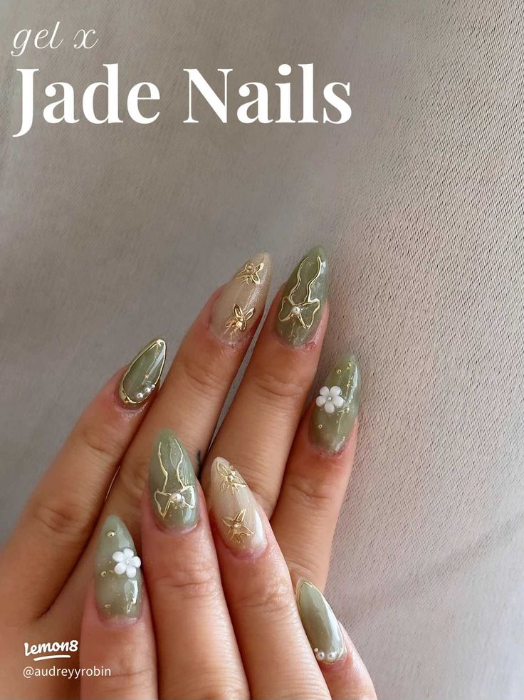 Sophisticated Jade-Themed Nail Design with Gold Accents and Floral Touches.