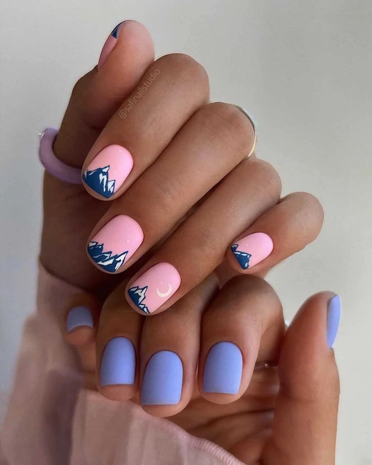 Playful Mountain-Inspired Pastel Nail Design with Minimalist Motifs and Modern Finishes.