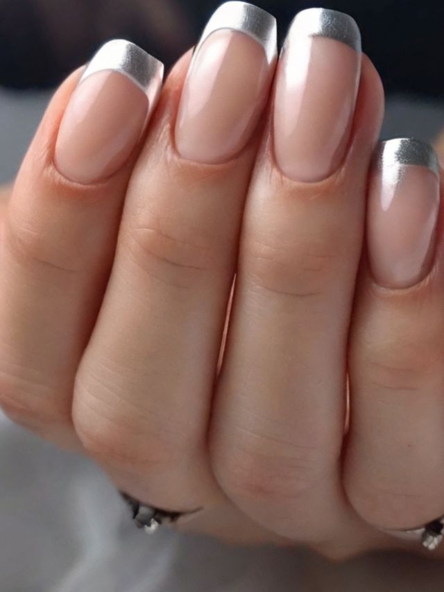 Sophisticated Metallic Silver-Tipped French Manicure: A Perfect Blend of Classic Elegance and Modern Glamour.