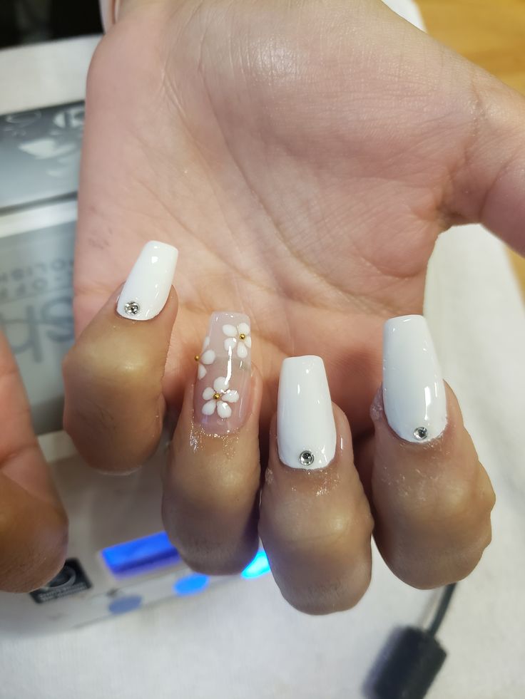 Sleek Modern White Nails with Glossy-Matte Finish and Glamorous Floral Accents