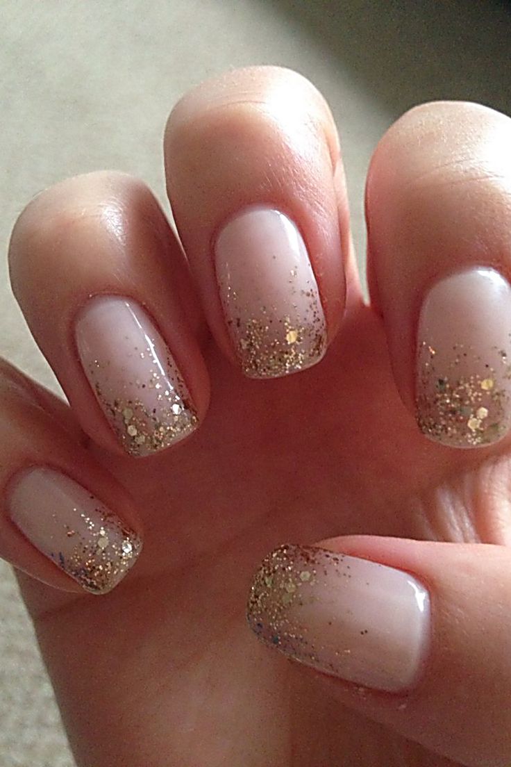 Elegant Nude Nails with Glitter Gradient for a Glamorous Touch.