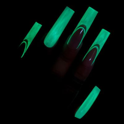 Vibrant Glow-in-the-Dark Nail Design: Elegantly Intricate Tips for Nighttime Elegance.