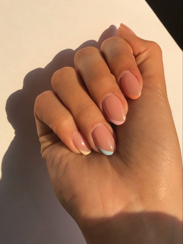 Elegant Nude Nail Design with Soft Pastel Tips for a Stylish Everyday Look.