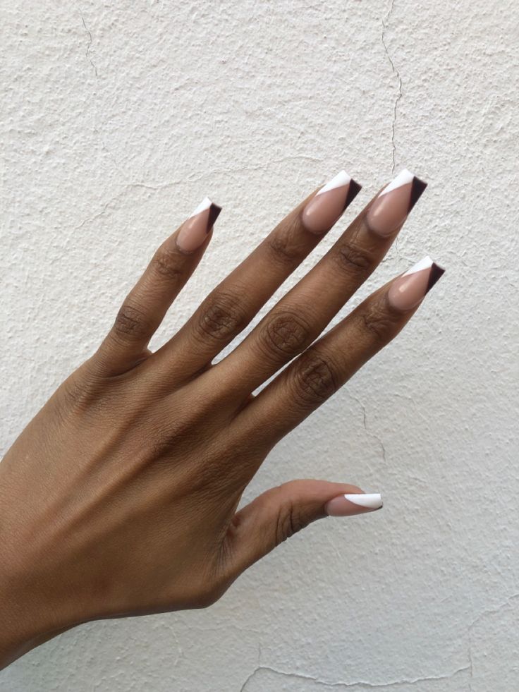 Chic Nude and White Triangular Nail Design for a Modern Elegance.