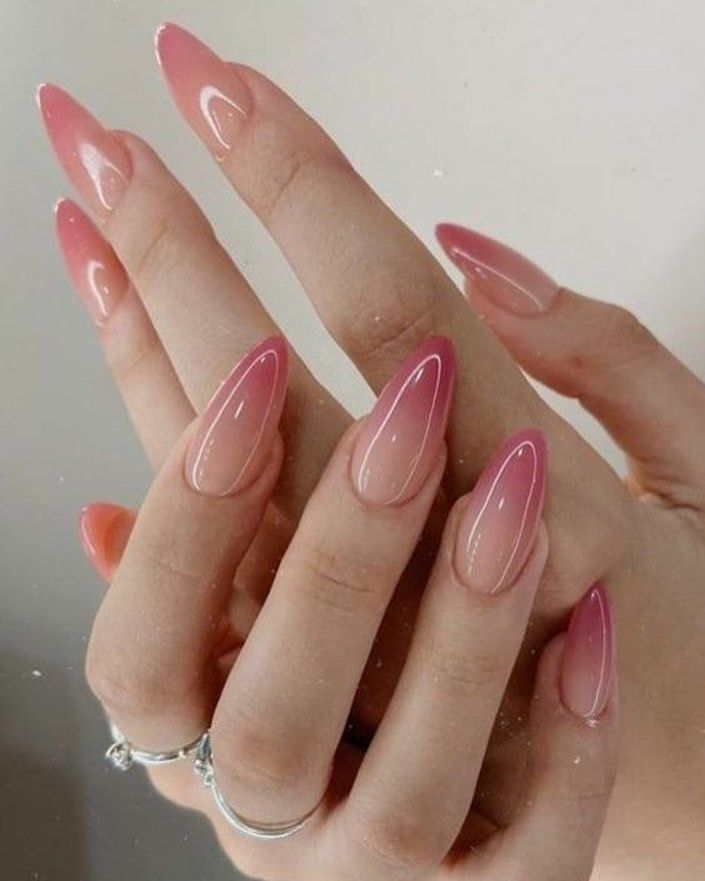 Chic Ombre Nail Design: Elegant Pink Gradient with Glamorous Accents.