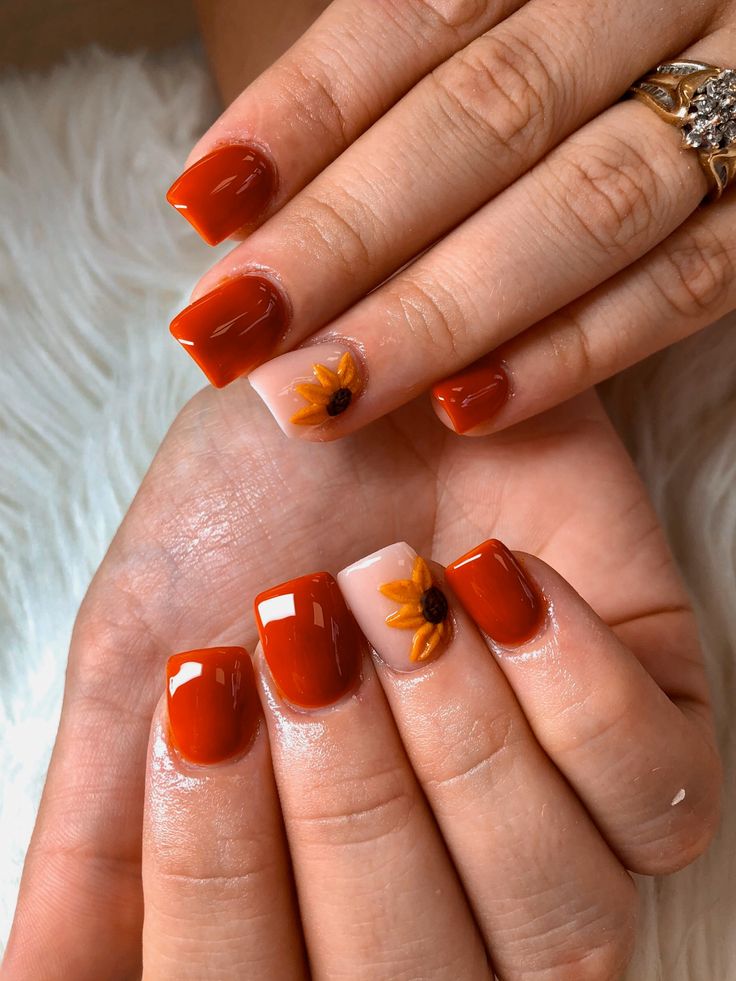 Bold Red and Sunflower Nail Design: A Cheerful Blend of Seasonal Colors and Artistic Flair.