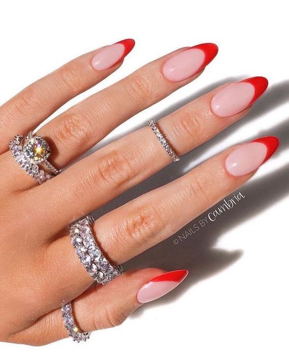 Chic Red-Tipped Nail Art: A Playful Contrast with Sparkling Accents