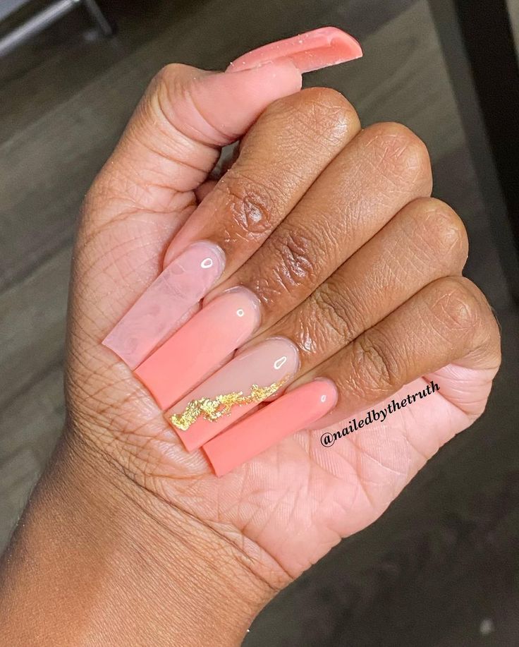 Elegant Peach and Nude Nail Design with Golden Accents