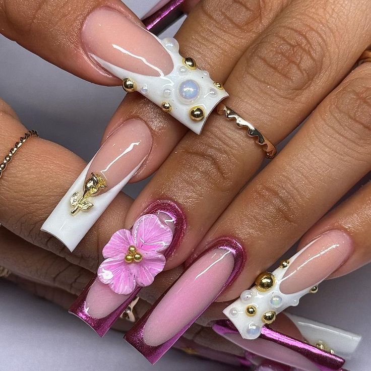 Sophisticated Coffin Nail Design with Soft Pink, White Hues, Floral Accents, and 3D Embellishments.