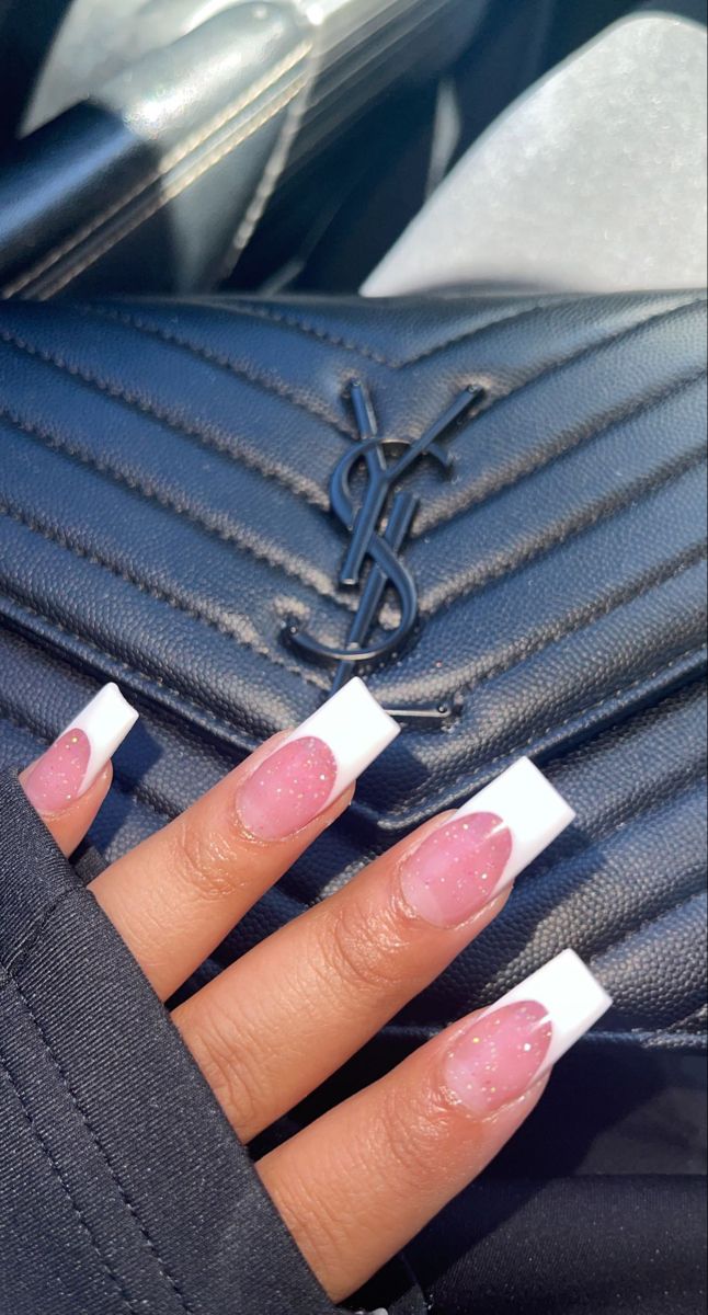 Sophisticated Elegant Manicure with Soft Pink, Glossy White Tips, and Subtle Sparkle.