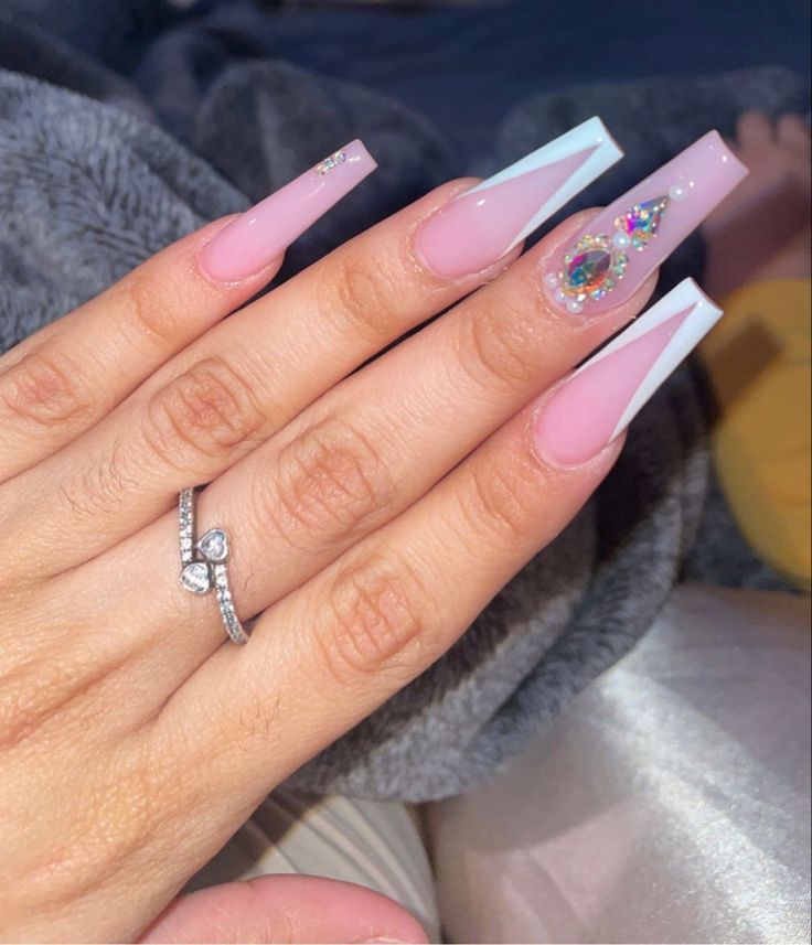 Chic Long Pink French Manicure with White Tips and Sparkling Rhinestones.