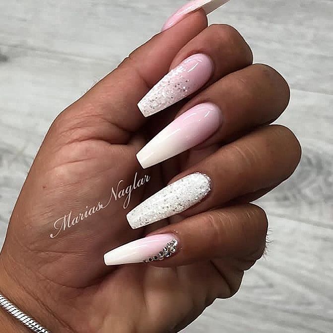 Sophisticated Almond-Shaped Ombre Nails with Glitter Accents and Rhinestone Detail.