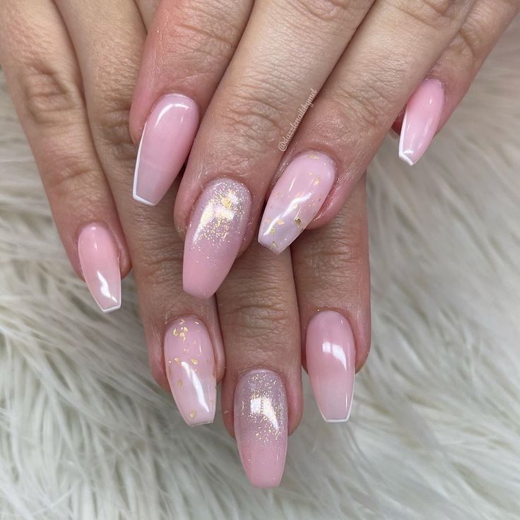 Chic Pink Nail Design: Glossy French Tips with Ombre, Glitter, and Gold Accents