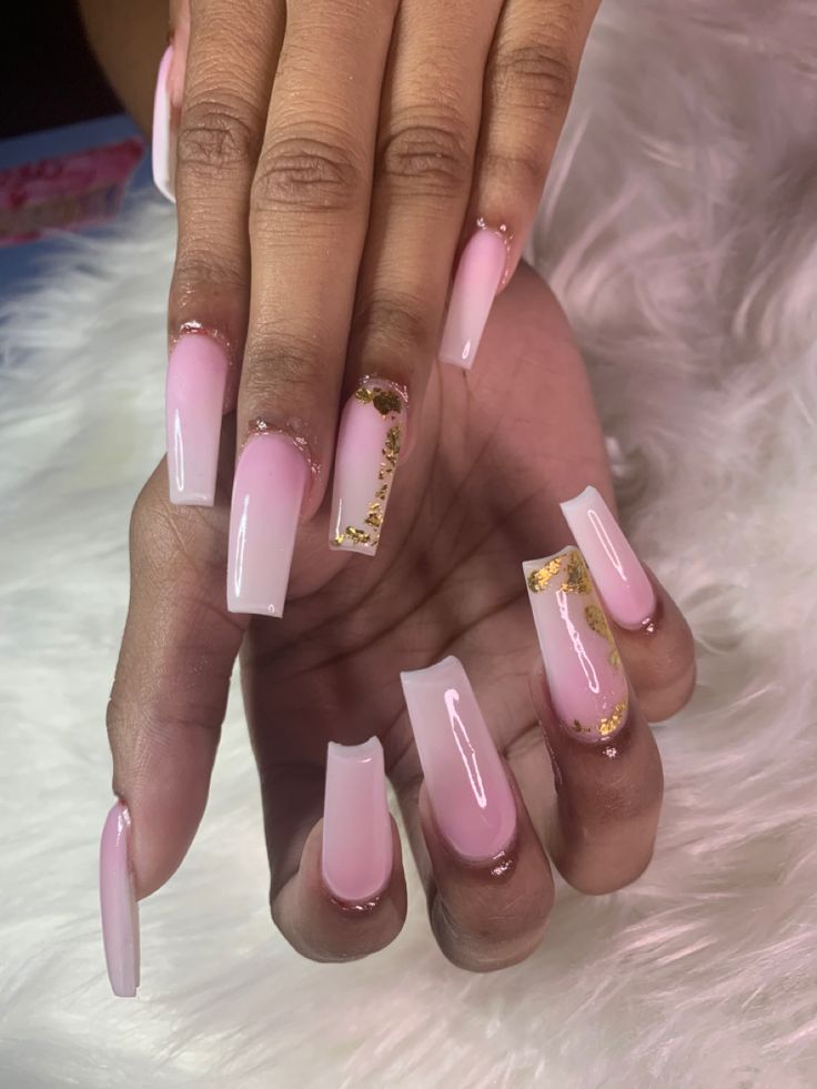 Chic Gradient Pink Nails with Delicate White Tips and Glamorous Gold Accents.