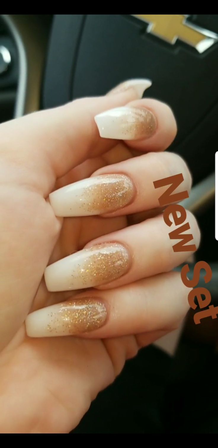 Chic Ombre Nail Design with Beige to Gold Transition and Glitter Accent