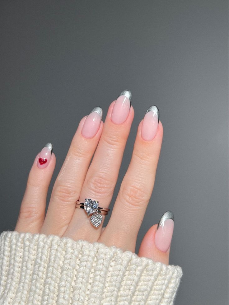 Chic Metallic French Tip Nail Design with Soft Pink Base and Heart Accent