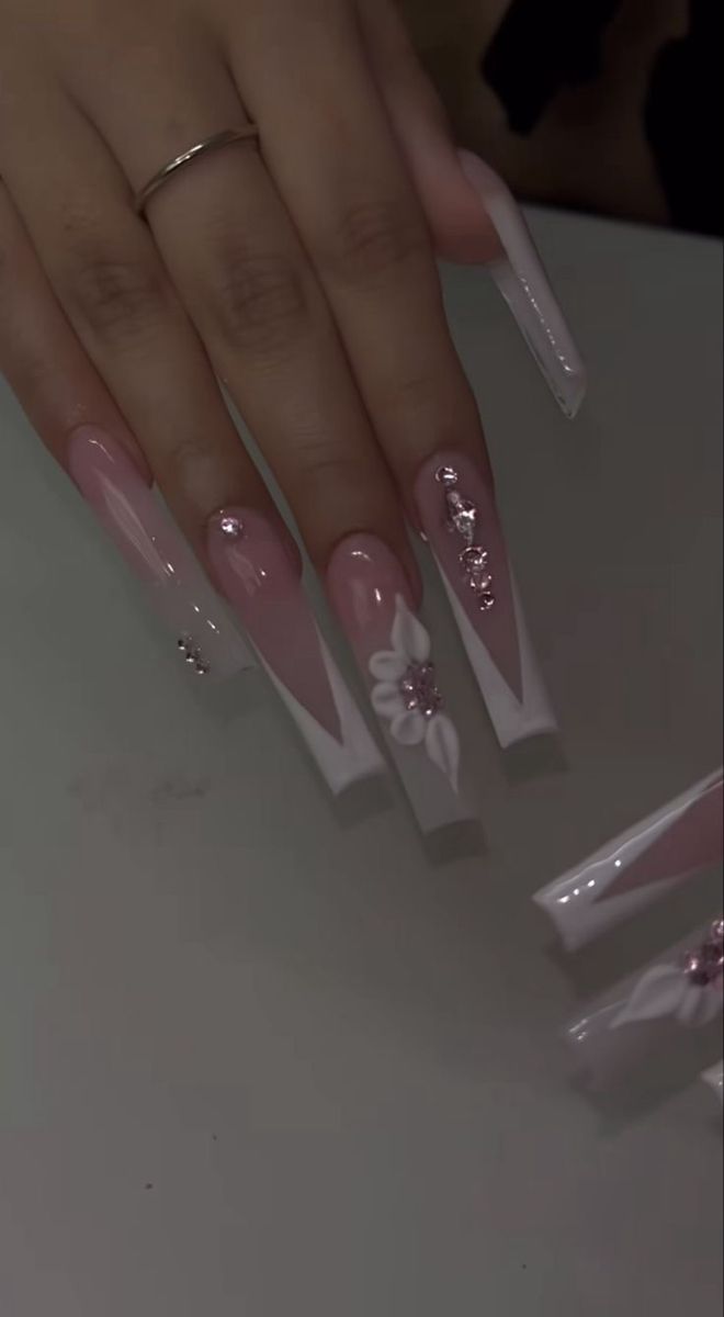 Chic Floral and Sparkling Long Acrylic Nails in Soft Pink and White for Elegant Occasions.