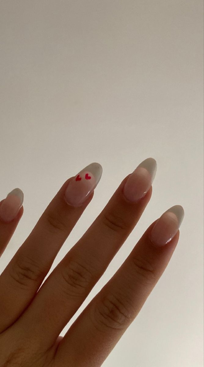 Charming Ombre Nail Design with Playful Red Heart Accent