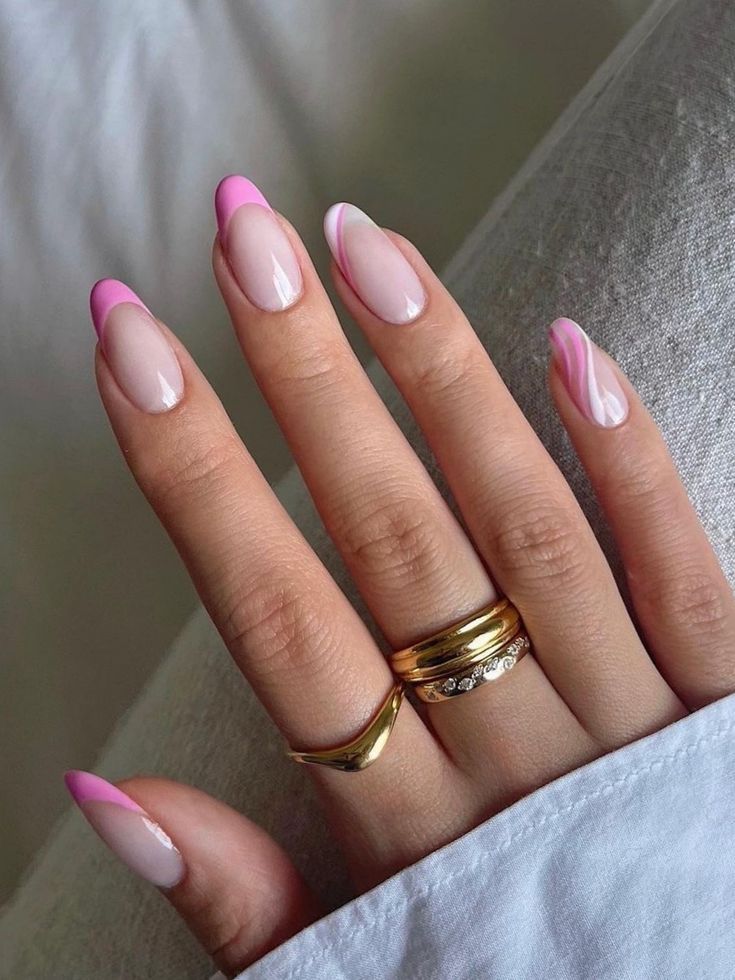 Chic Pink French Tip Manicure with Soft Nude Base and Gold Accents.