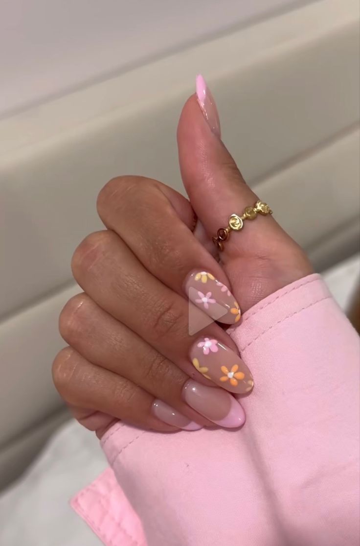 Charming Pastel Floral Nail Design with Elegant Accents.