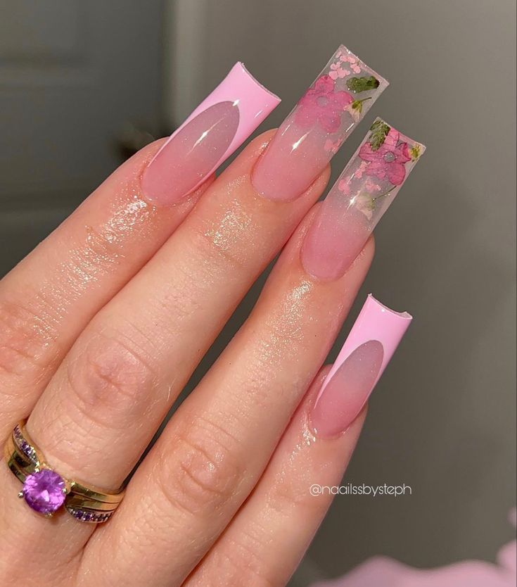 Elegant Floral Nail Design in Soft Pink with Glossy Finish on Long Square Nails