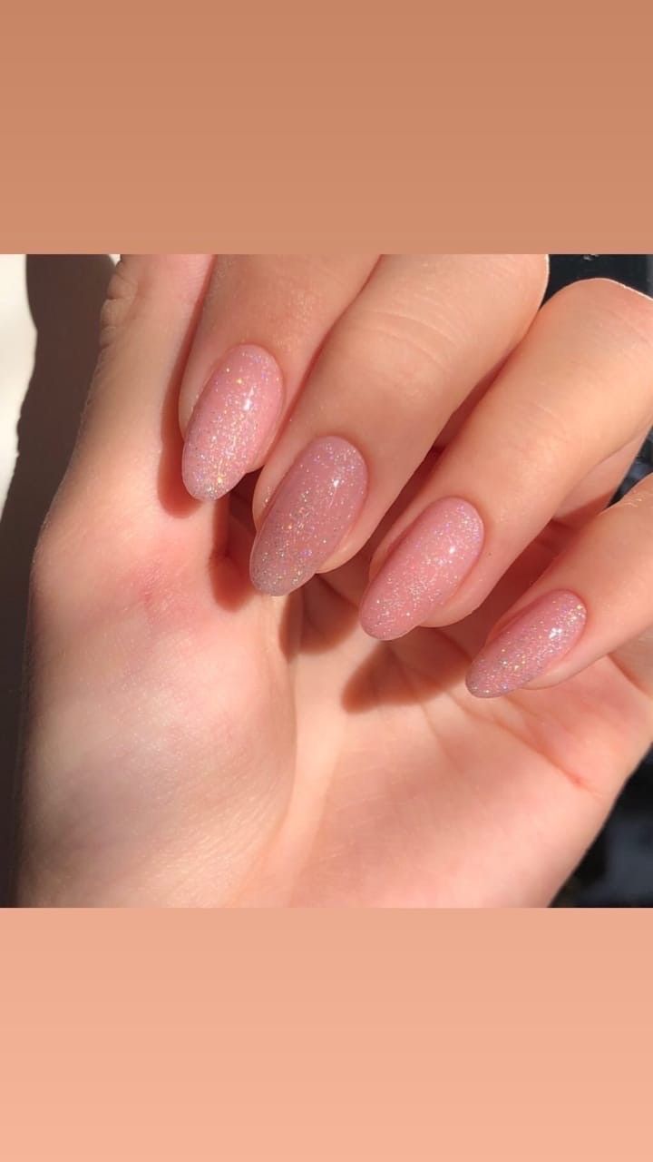 Elegant Almond-Shaped Pink Glitter Nails for Any Occasion