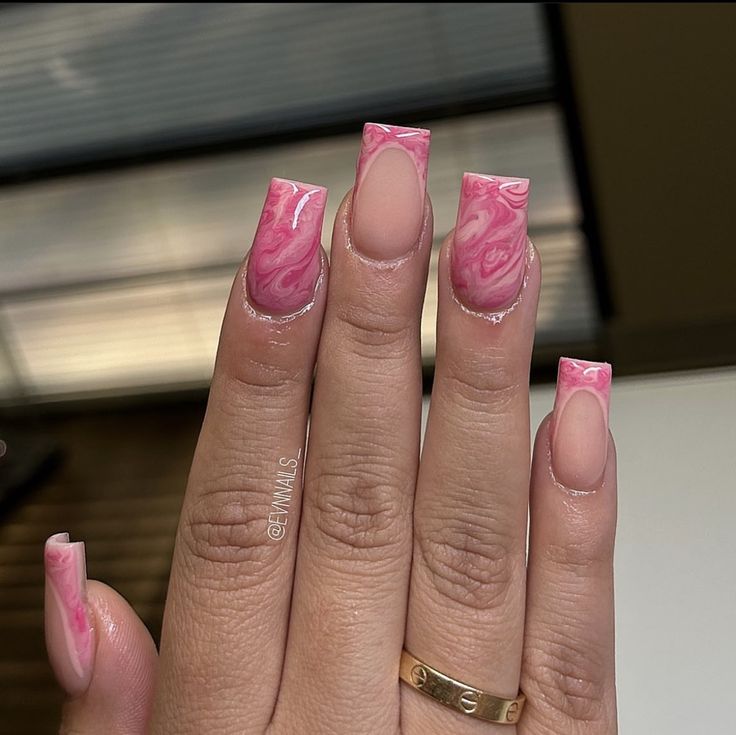 Vibrant Swirled Pink Marble Nail Design with Elegant Square Tips on a Nude Base.