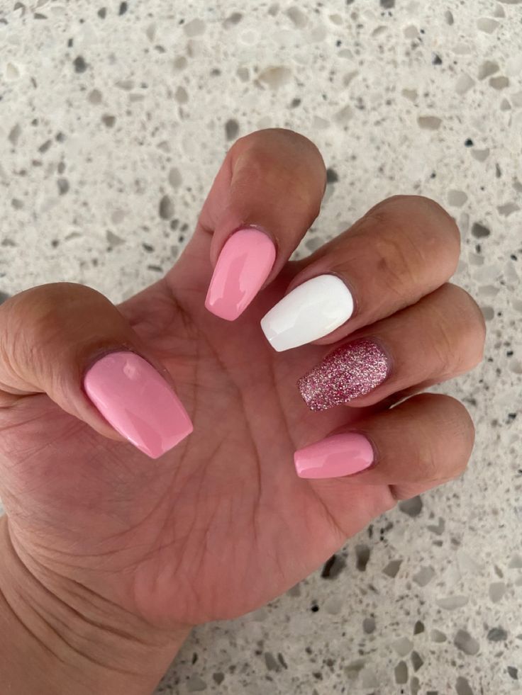 Playful Pink and White Nails with Glamorous Glitter Accent