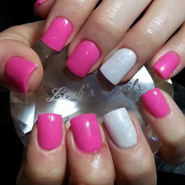 Chic Vibrant Pink and Shimmering Silver Nail Design for Any Occasion.