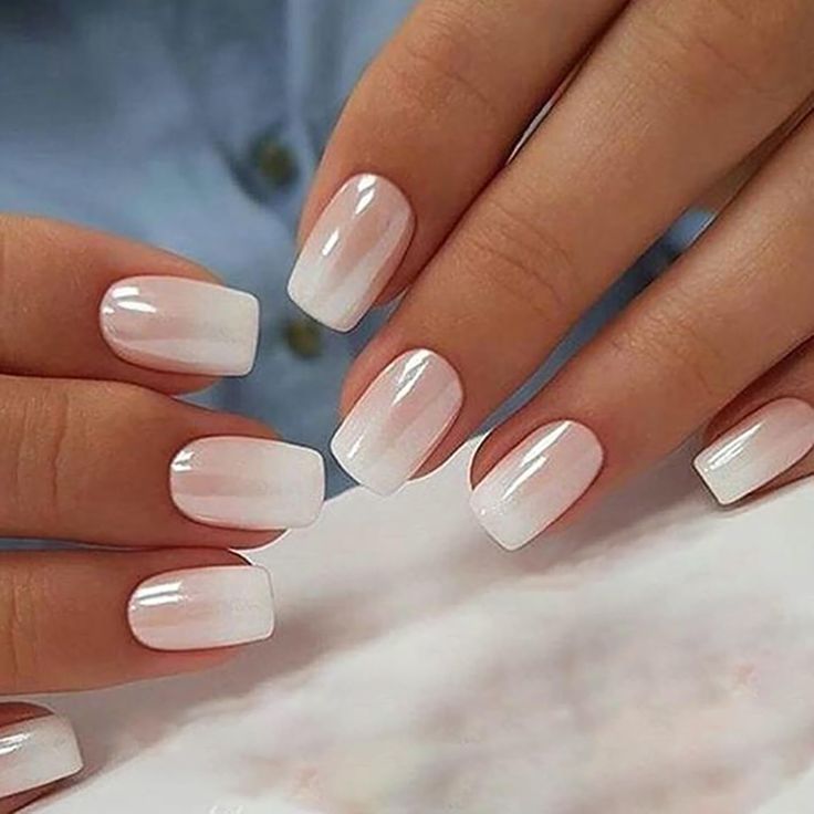 Elegant Ombre Nail Design: A Seamless White Transition with Modern Square Tips.