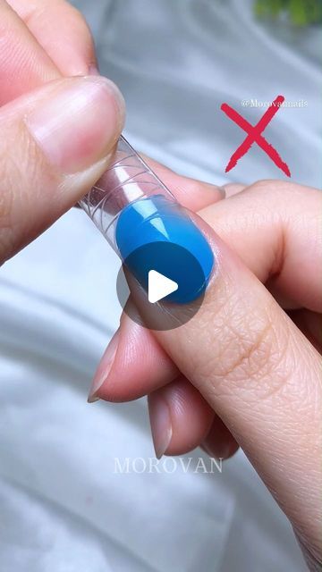 Innovative Bright Blue Gel Nail Technique Showcases Creative Precision in Manicures.