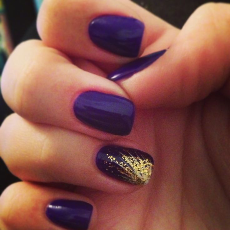 Striking Bold Purple Nails with Elegant Gold Glitter Accent.